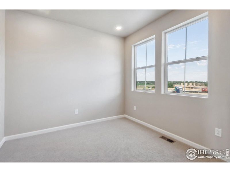 Spacious, unfurnished interior of a new home in The Overlook at Johnstown Farms, Johnstown (Image 15).