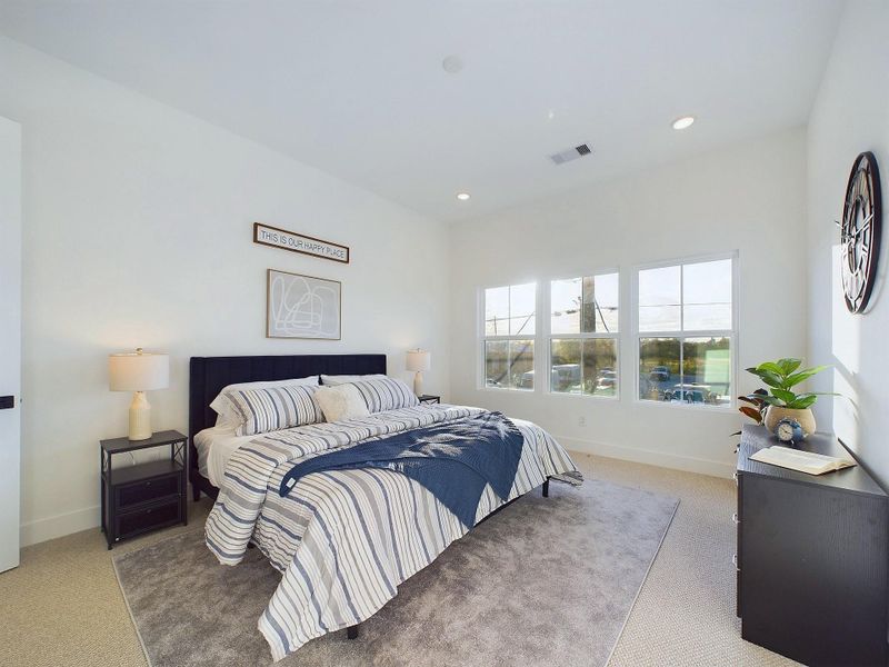 MOVE-IN READY! This spacious primary room is located on the second floor, big windows allow in lots of natural lighting. FINISHES & FLOOR PLANS WILL VARY! Ceiling fans are not included!