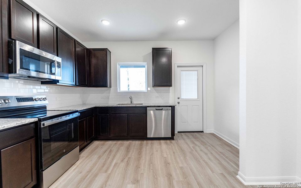 Furnished interior view inside a new home in Katzer Ranch, Converse (Image 4).