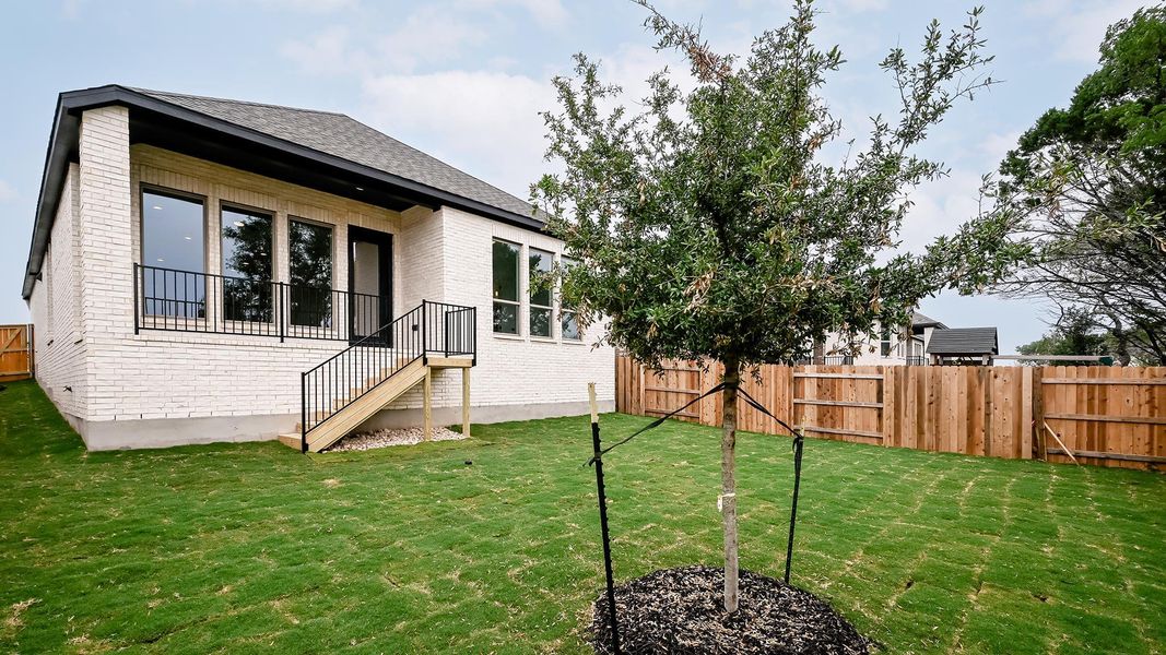 Exterior details and patio area of a home in 6 Creeks, Kyle (Image 3).