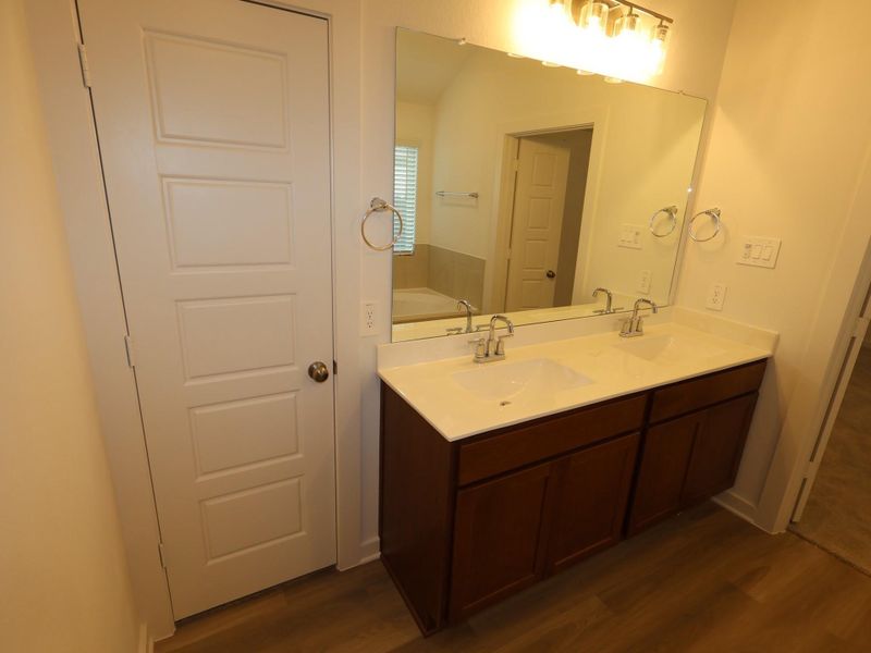 Furnished interior view inside a new home in Pinewood at Grand Texas, New Caney (Image 6).