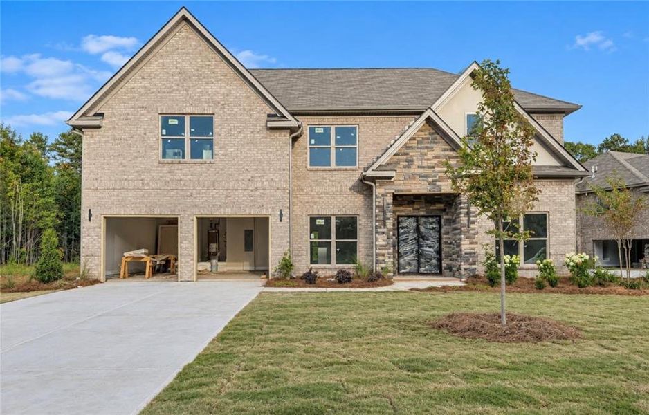 Front exterior of a new home in , Covington, GA, highlighting curb appeal (Image 2). Front exterior of a new home in , Covington, GA, highlighting curb appeal (Image 2).