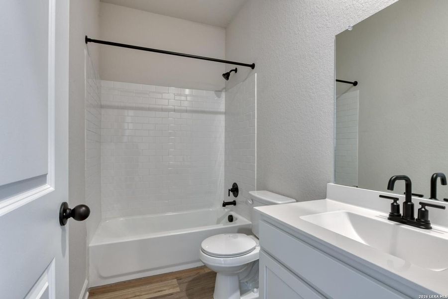 Furnished interior view inside a new home in Hennersby Hollow, San Antonio (Image 4).