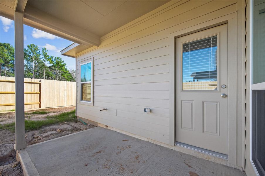 Exterior details and patio area of a home in Enclave at Willis, Willis (Image 23).