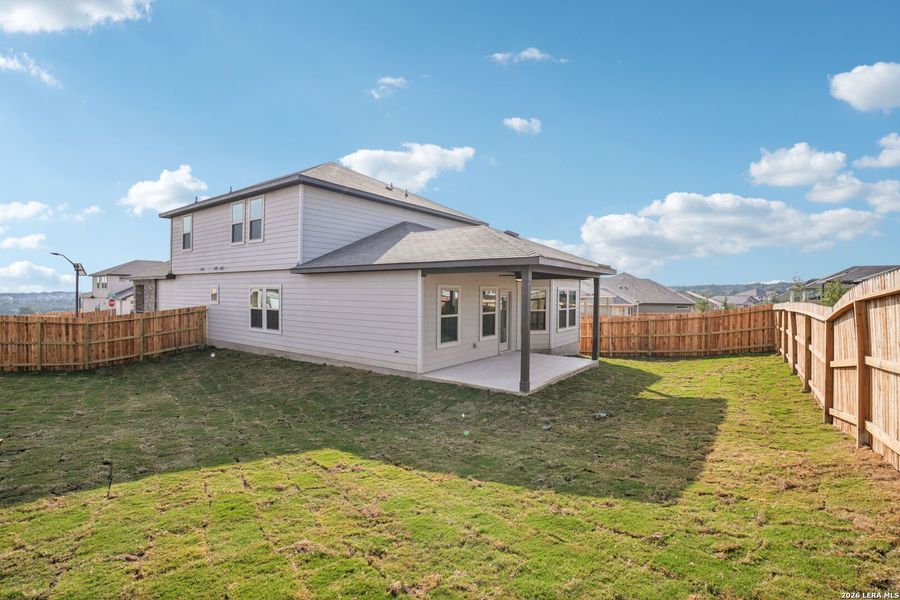 Exterior details and patio area of a home in Lark Canyon, New Braunfels (Image 21).