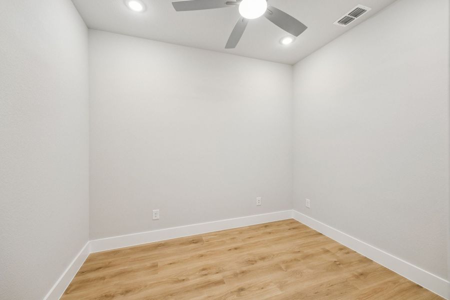 Representative unfurnished interior of a home built from the Adolphus by Centre Living Homes in Painted Tree Woodland West, McKinney (Image 22).