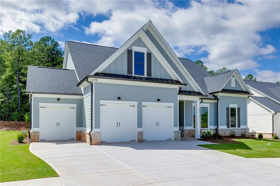 Front exterior of a new home in , Statham, GA, highlighting curb appeal (Image 23).