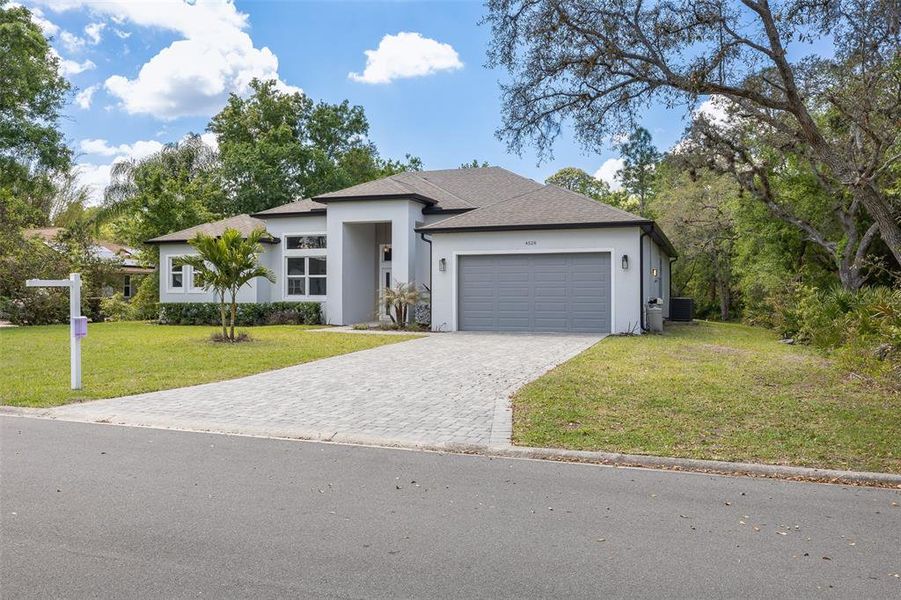 Front exterior of a new home in , Kissimmee, FL, highlighting curb appeal (Image 2). Front exterior of a new home in , Kissimmee, FL, highlighting curb appeal (Image 2).