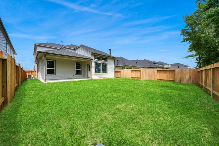 Come and see this spacious backyard with its beautiful covered patio. There is plenty of room for the kids to play and adults to relax. Perfect for your outdoor living space, patio furniture, bbq pit, and so much more. The possibilities are endless! Come and see this spacious backyard with its beautiful covered patio. There is plenty of room for the kids to play and adults to relax. Perfect for your outdoor living space, patio furniture, bbq pit, and so much more. The possibilities are endless!