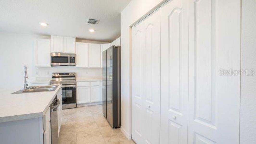 Furnished interior view inside a new home in Royal Highlands, Weeki Wachee (Image 12).