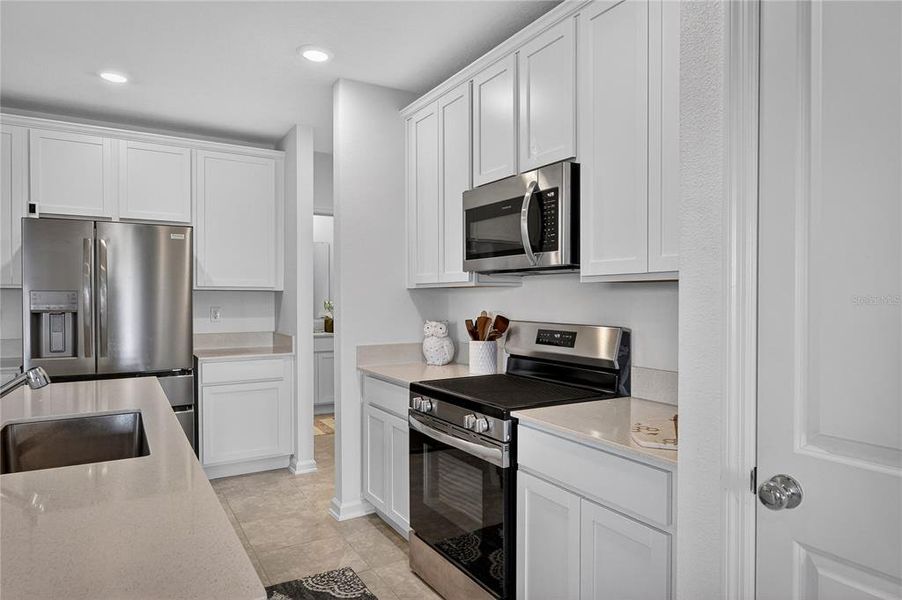 Furnished interior view inside a new home in Preserve at LPGA: Manor Collection, Daytona Beach (Image 11).