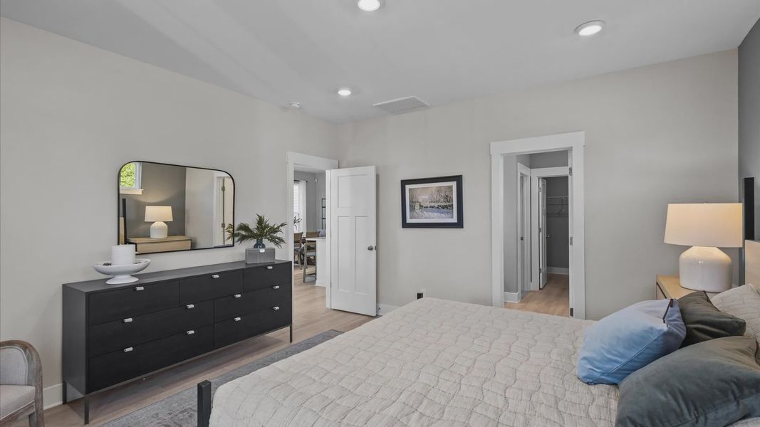 Mint home plan spacious primary suite and en suite bathroom