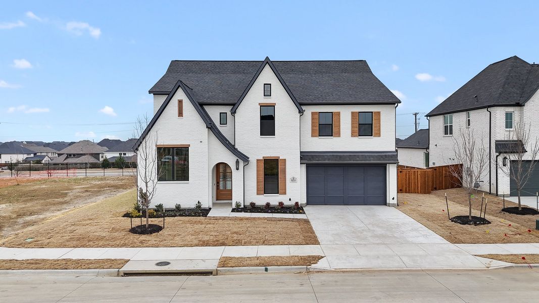 Front exterior of a new home in Park Place - 80' Lots, Prosper, TX, highlighting curb appeal (Image 25). Front exterior of a new home in Park Place - 80' Lots, Prosper, TX, highlighting curb appeal (Image 25).
