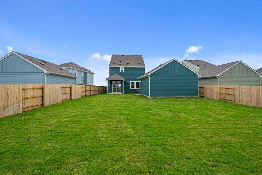 Rear of Home and Private Backyard