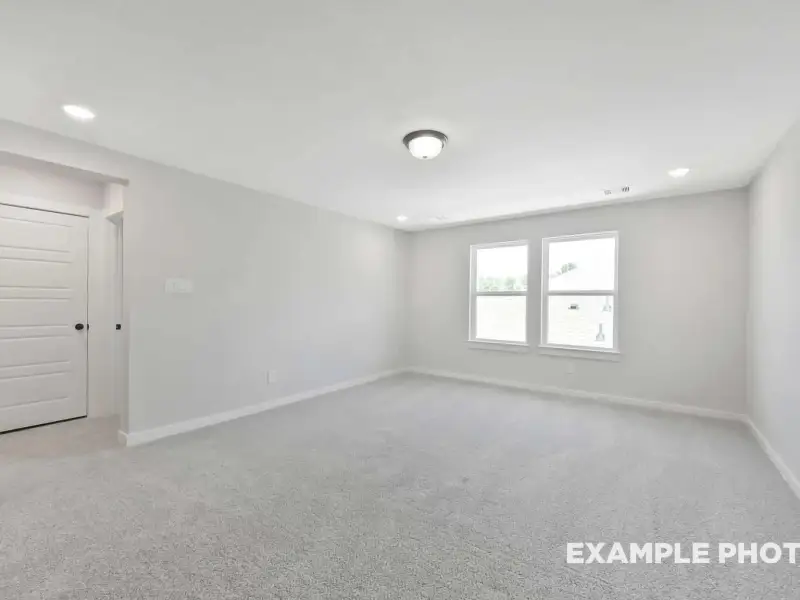Spacious, unfurnished interior of a new home in Sundance Cove, Crosby (Image 23).