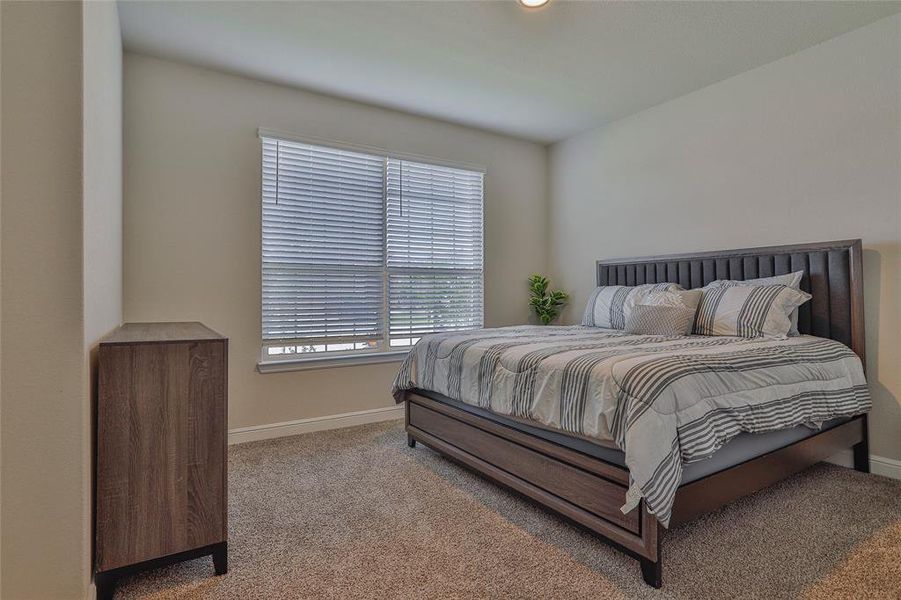 Bedroom with carpet and recessed lighting Bedroom with carpet and recessed lighting
