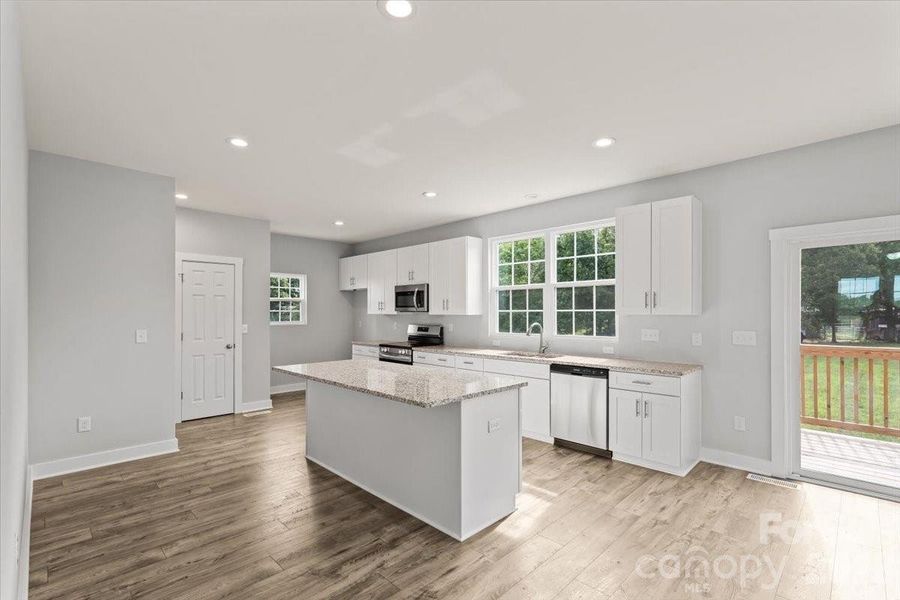 Furnished interior view inside a new home in , Monroe (Image 6).