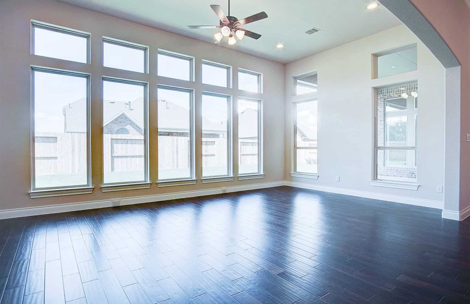Representative unfurnished interior of a home built from the 3710 by Ravenna Homes in Artavia 70′, Conroe (Image 28).