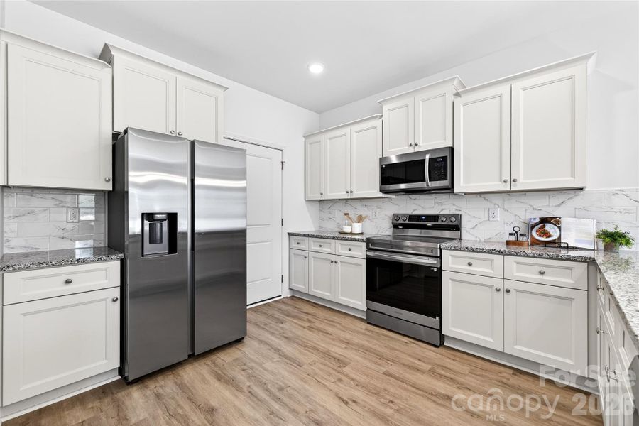 Furnished interior view inside a new home in , Charlotte (Image 7).