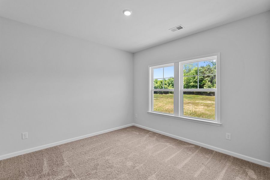Spacious, unfurnished interior of a new home in Lilah Grove, Summerfield (Image 38).