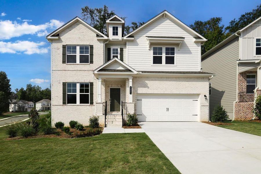 Front exterior of a new home in Falls Creek, Flowery Branch, GA, highlighting curb appeal (Image 21). Front exterior of a new home in Falls Creek, Flowery Branch, GA, highlighting curb appeal (Image 21).