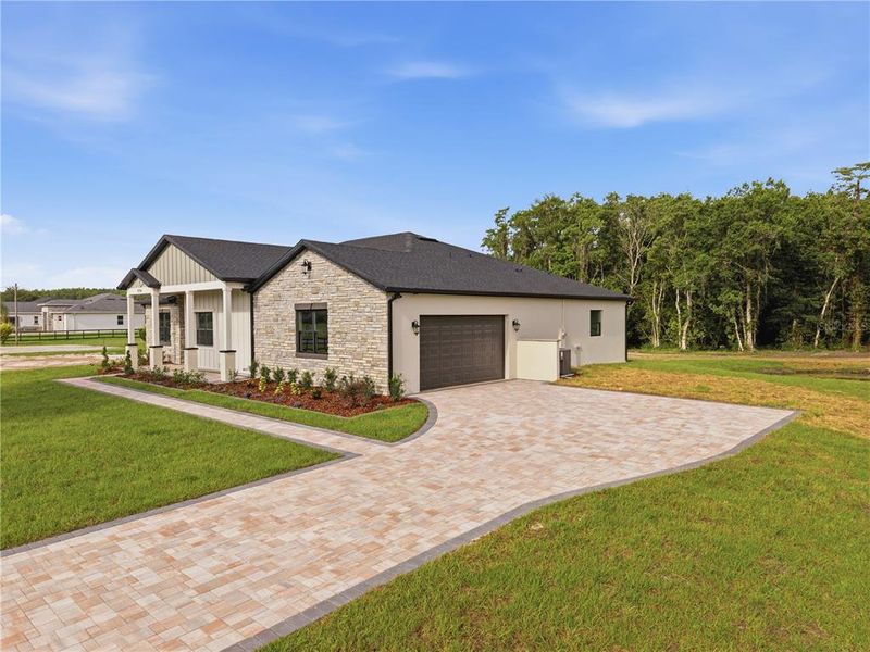 Front exterior of a new home in , St. Cloud, FL, highlighting curb appeal (Image 31).