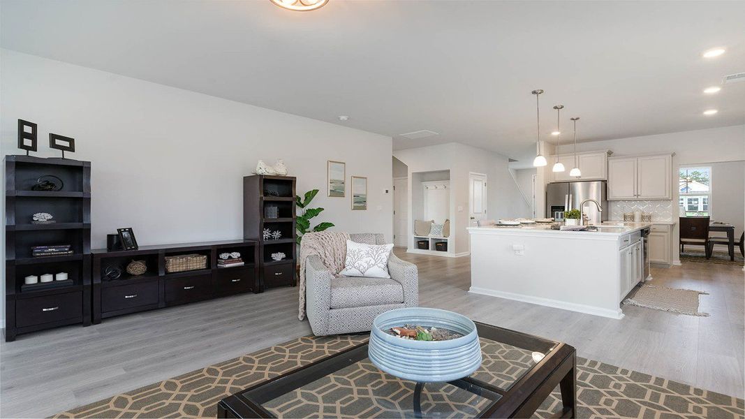 Representative furnished interior of a home built from the TILLMAN by D.R. Horton in Spring View Landing, Loris (Image 11).