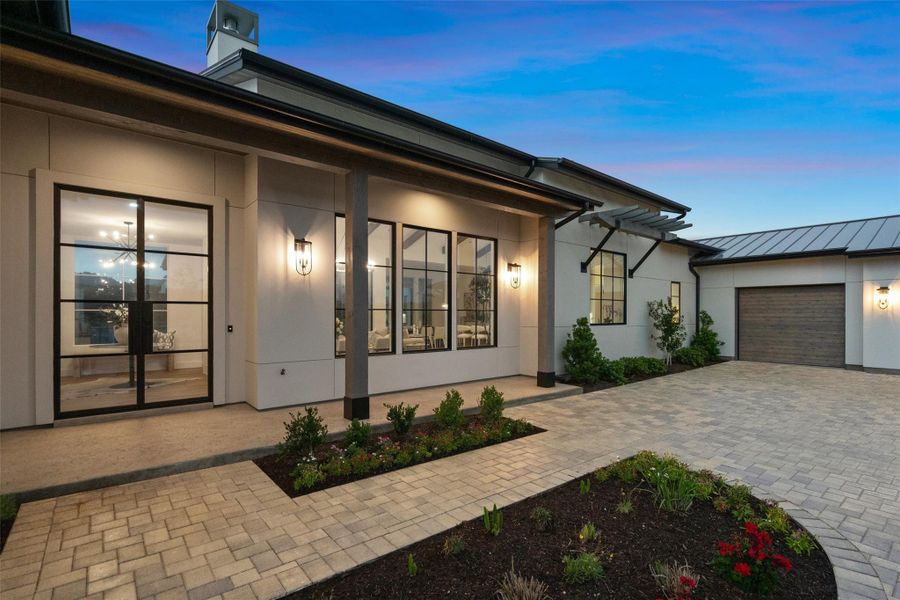 Steel Front Door and Oversized Windows