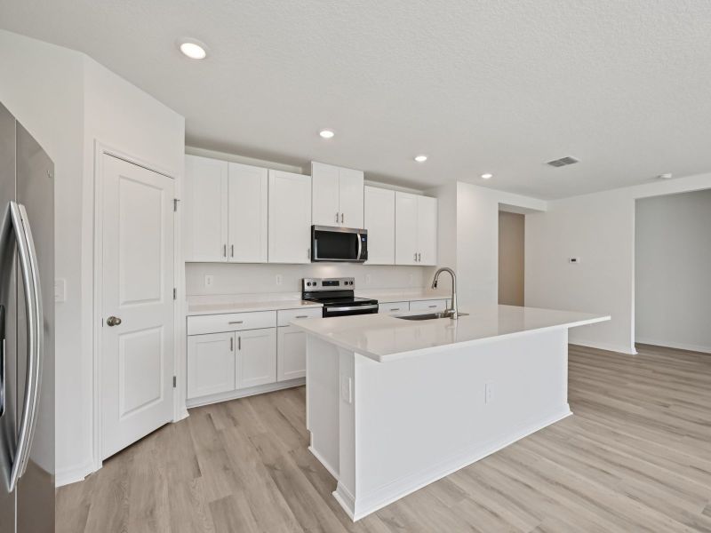 Furnished interior view inside a new home in Salt Meadows - Classic Series, Parrish (Image 3).