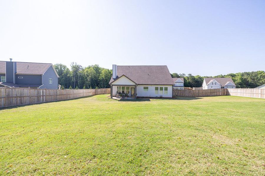 Front exterior of a new home in , Winder, GA, highlighting curb appeal (Image 21).