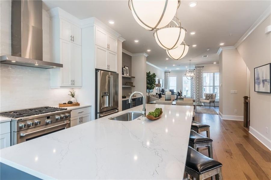Expansive main level space with beautiful Chefs style kitchen with upgraded appliances, lighting, cabinets and tops. Expansive main level space with beautiful Chefs style kitchen with upgraded appliances, lighting, cabinets and tops.