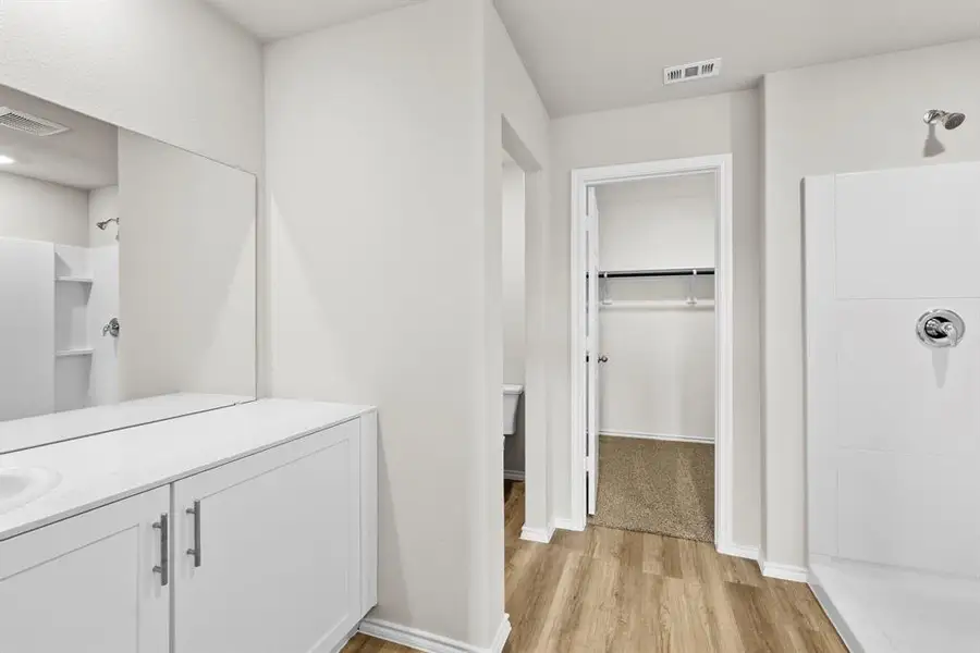 Furnished interior view inside a new home in Sunnycreek, Crowley (Image 10).