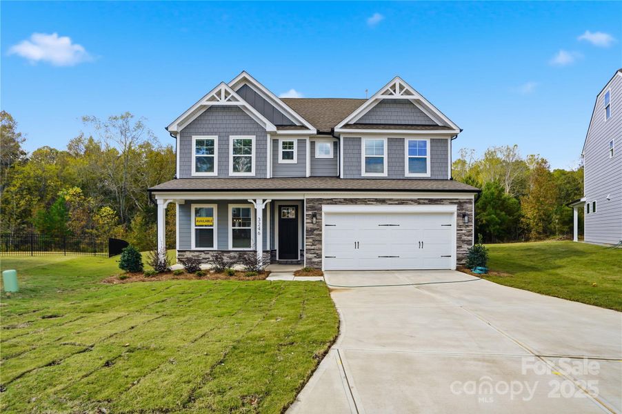 Front exterior of a new home in Carrington, Stanley, NC, highlighting curb appeal (Image 1). Front exterior of a new home in Carrington, Stanley, NC, highlighting curb appeal (Image 1).