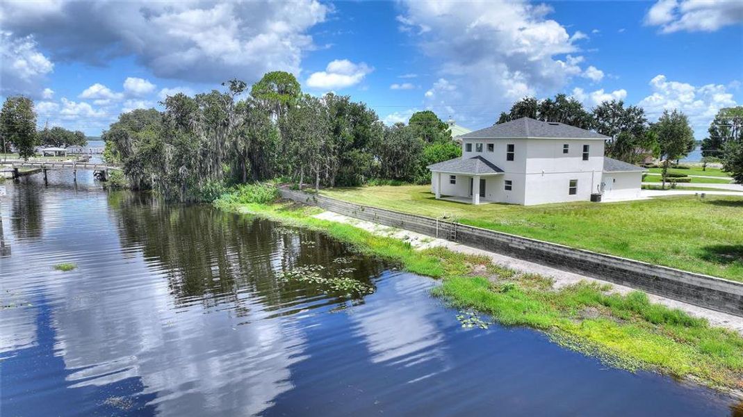 Front exterior of a new home in , Lake Placid, FL, highlighting curb appeal (Image 2). Front exterior of a new home in , Lake Placid, FL, highlighting curb appeal (Image 2).