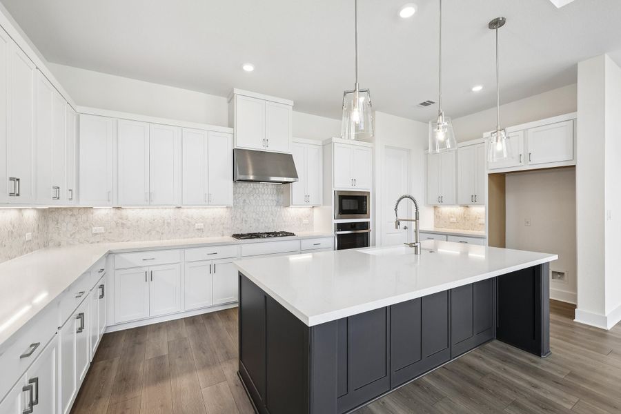 Representative furnished interior of a home built from the Rainey by Taylor Morrison in Santa Rita Ranch, Liberty Hill (Image 5).