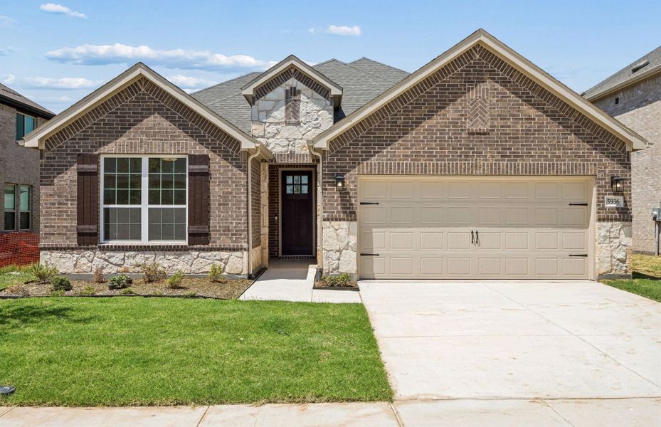 Front exterior of a new home in Creekview Meadows, Pilot Point, TX, highlighting curb appeal (Image 1). Front exterior of a new home in Creekview Meadows, Pilot Point, TX, highlighting curb appeal (Image 1).