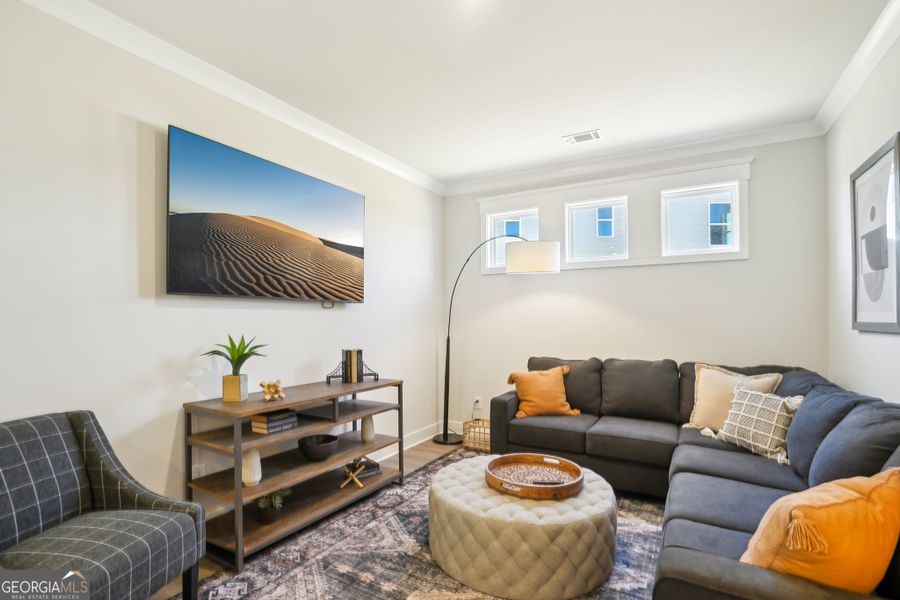 Furnished interior view inside a new home in Ponderosa Farms Reserve, Gainesville (Image 3).