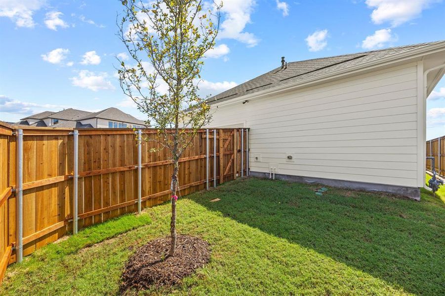 Exterior details and patio area of a home in The Heights at Uptown Celina, Celina (Image 4).