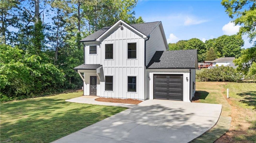Front exterior of a new home in , Rome, GA, highlighting curb appeal (Image 18).