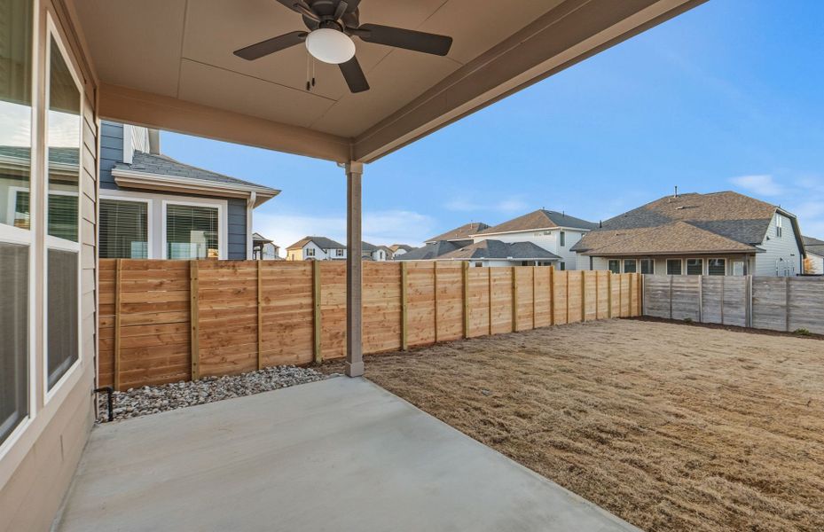 Exterior details and patio area of a home in Horizon Lake, Leander (Image 26).