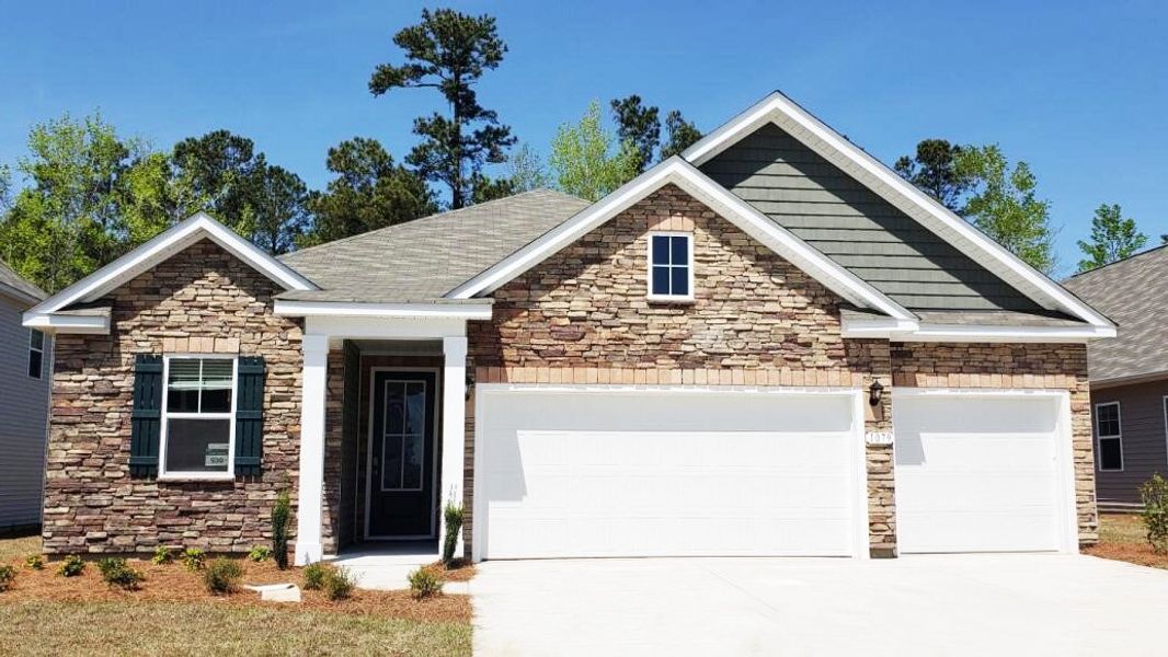 Representative exterior photo of a completed home built from the Madison by D.R. Horton in Auberon Woods, Conway, SC (Image 2). Representative exterior photo of a completed home built from the Madison by D.R. Horton in Auberon Woods, Conway, SC (Image 2).