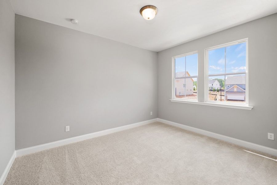 Representative unfurnished interior of a home built from the Glynn by UnionMain Homes in Austin Springs, Bethlehem (Image 23).
