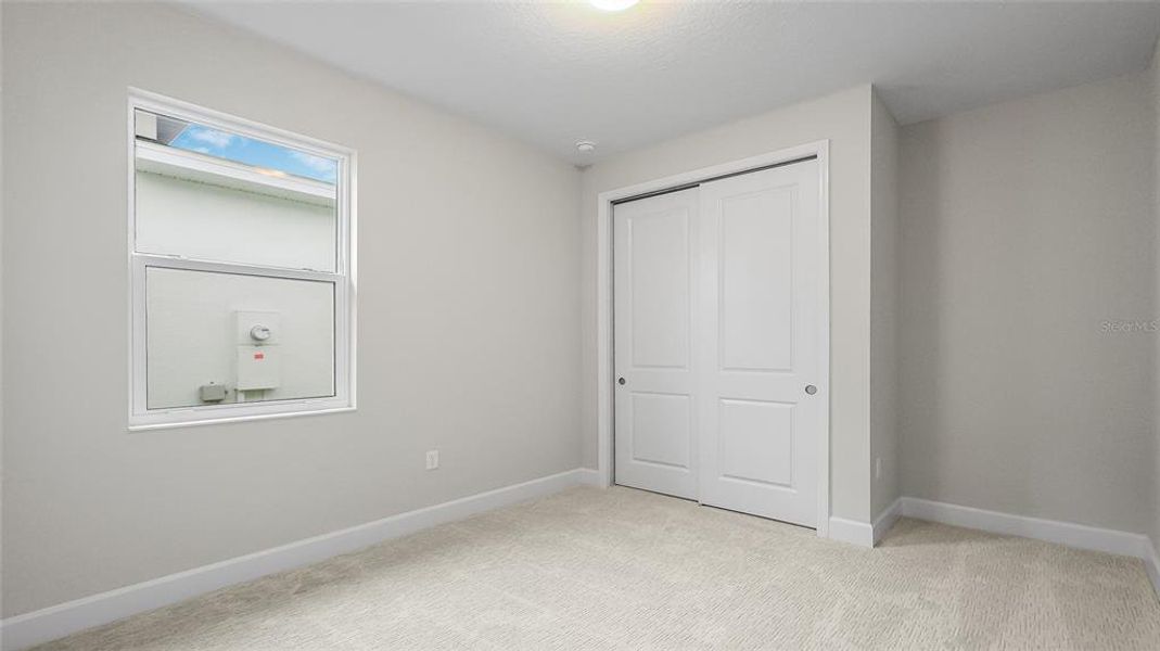 Spacious, unfurnished interior of a new home in Cresswind at Hammock Oaks, Lady Lake (Image 51).