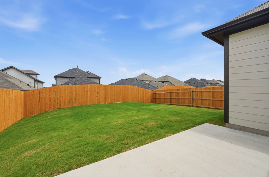Exterior details and patio area of a home in Trinity Ranch, Elgin (Image 17).