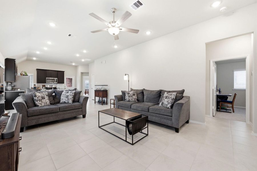 Spacious living area with an abundance of light.