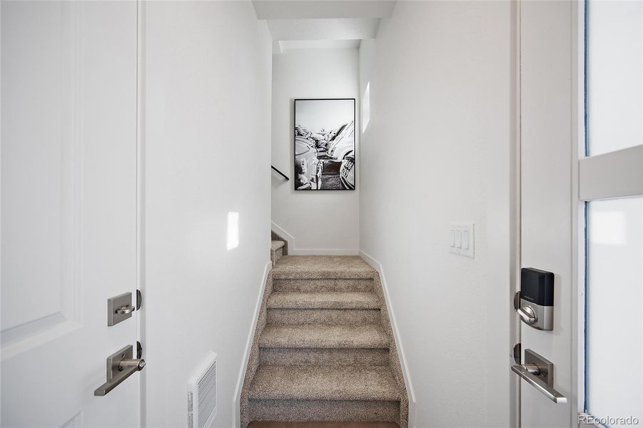 Furnished interior view inside a new home in The Commons at Victory Ridge, Colorado Springs (Image 26).