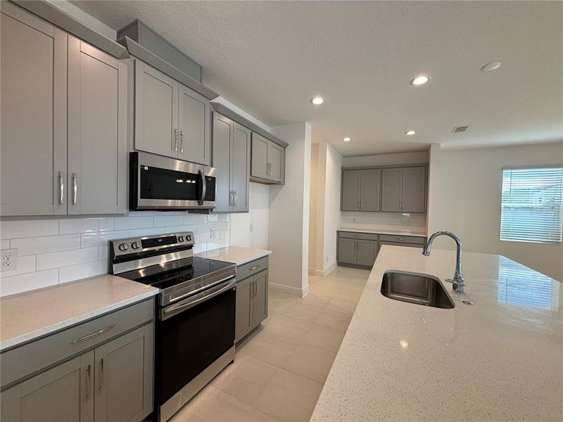 Furnished interior view inside a new home in Trinity Lakes, Groveland (Image 5).