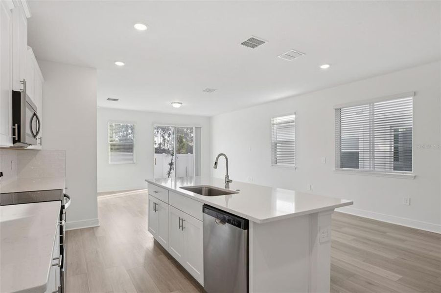 Furnished interior view inside a new home in Cyrene at Minneola - Villas, Minneola (Image 9).