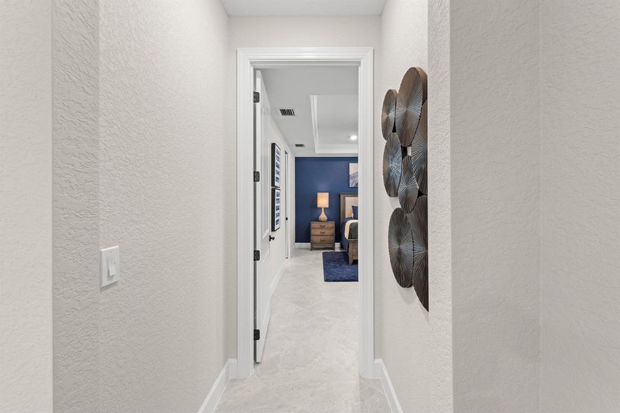 Furnished interior view inside a new home in Del Webb Tradition, Port St. Lucie (Image 37). Furnished interior view inside a new home in Del Webb Tradition, Port St. Lucie (Image 37).