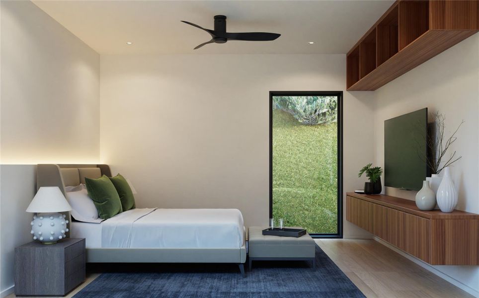 Bedroom with wood finished floors and ceiling fan